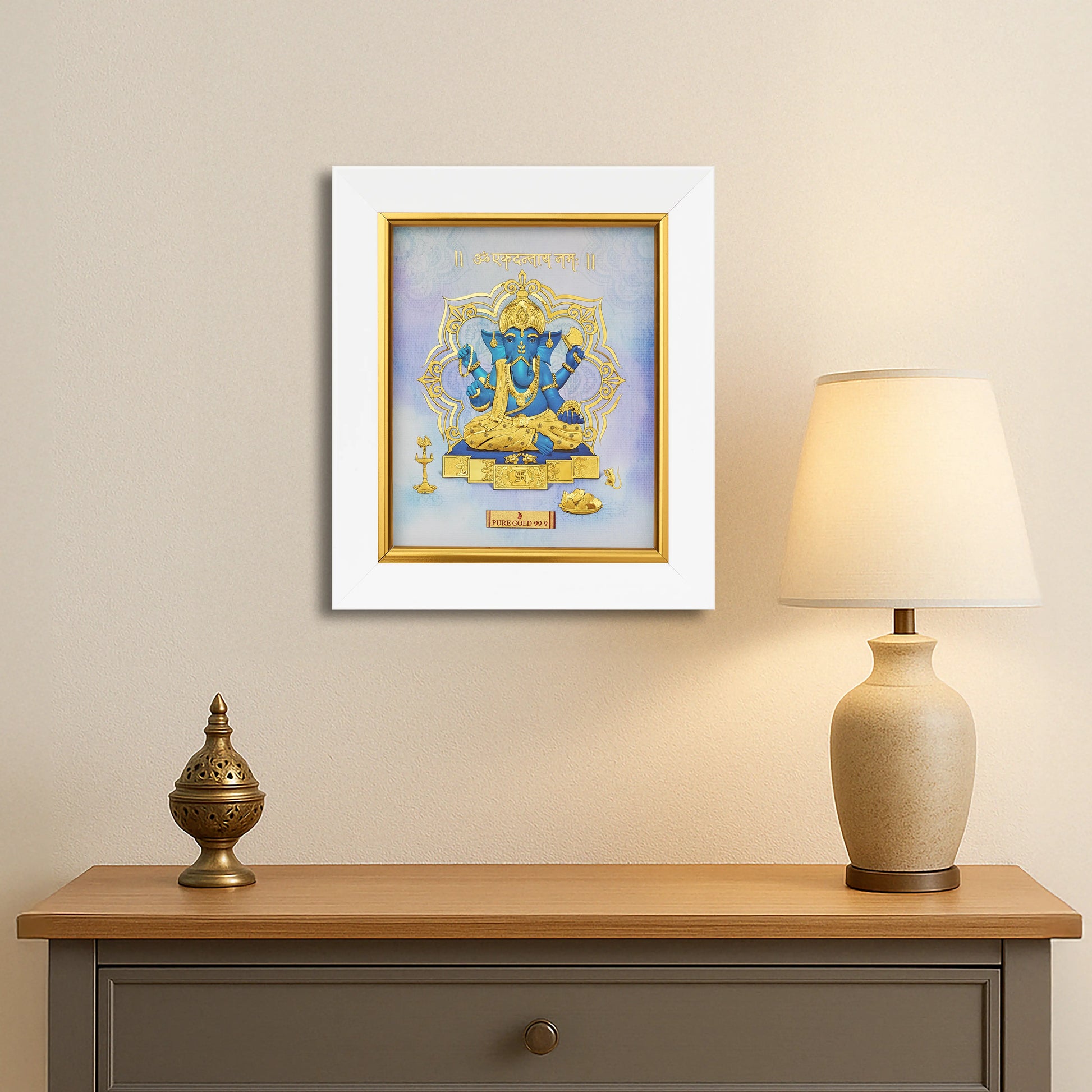 Lord Ganesha wall frame in gold by prima art. A perfect gift for housewarming and home temple. Vaastu approved.